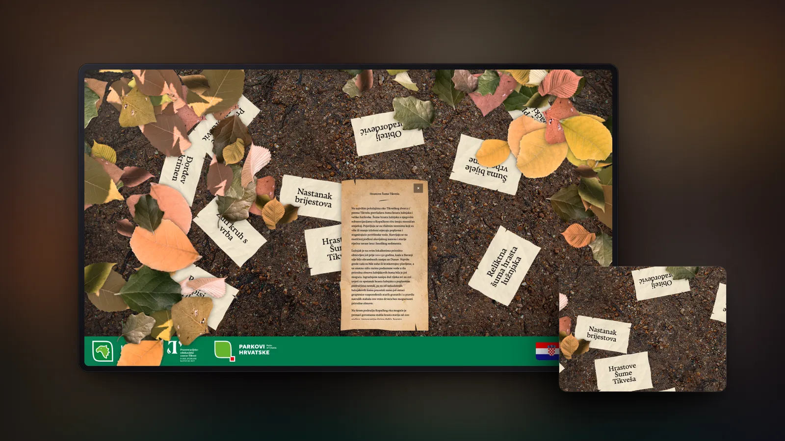The Prince Đorđe app on a large touch screen: paper notes among photographed autumn leaves on a forest floor, one of them opened, with a close-up of the papers.